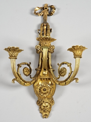 An Exceptional Pair of Louis XVI Style Ormolu Three-Light Sconces